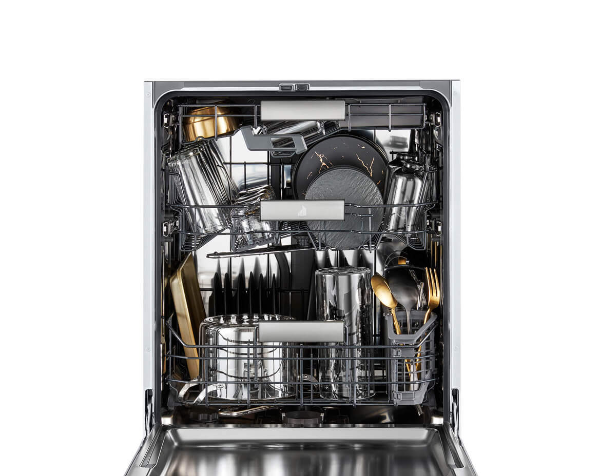 A Rise Dishwasher full of silver and gold dishes.