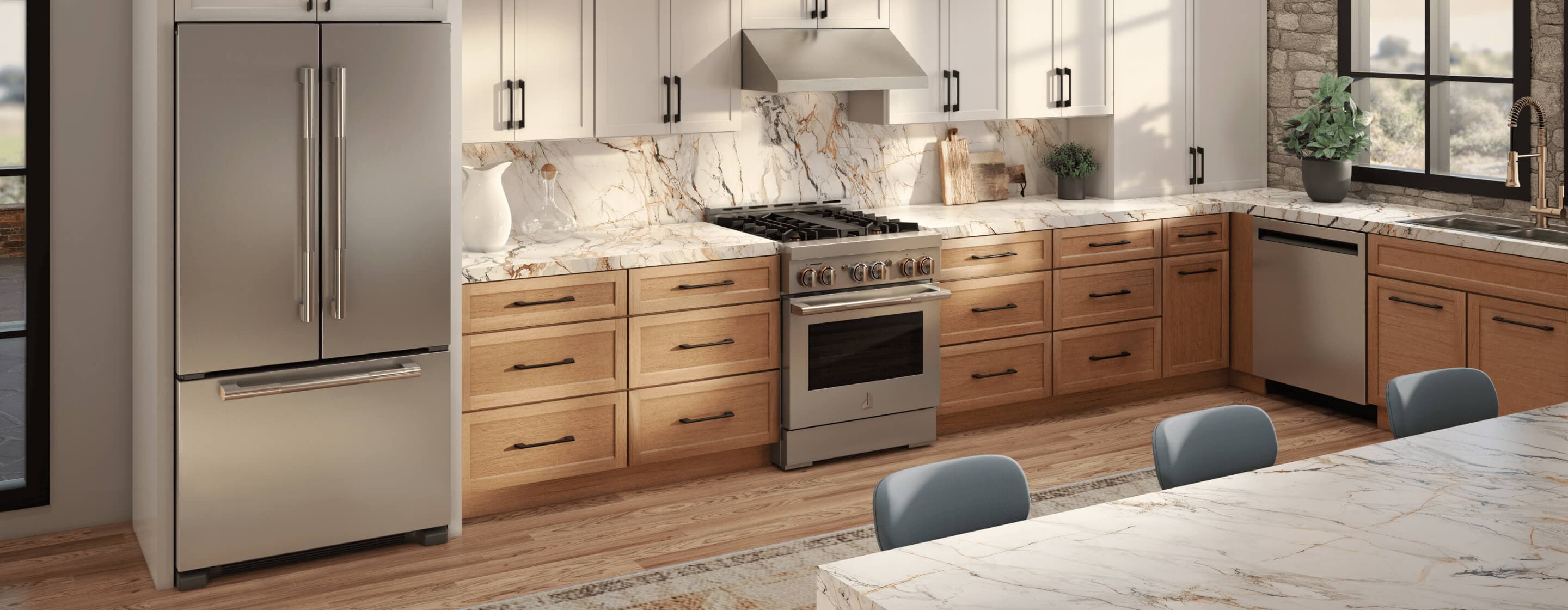 A modern open-concept kitchen with a built-in refrigerator and large kitchen island for entertaining.