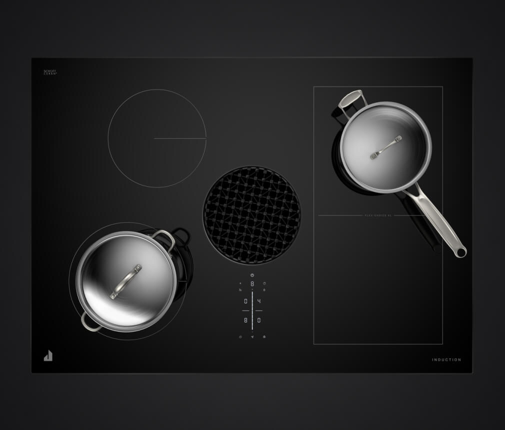 An overhead shot of a pot and a pan on a JennAir® Induction Downdraft Cooktop.
