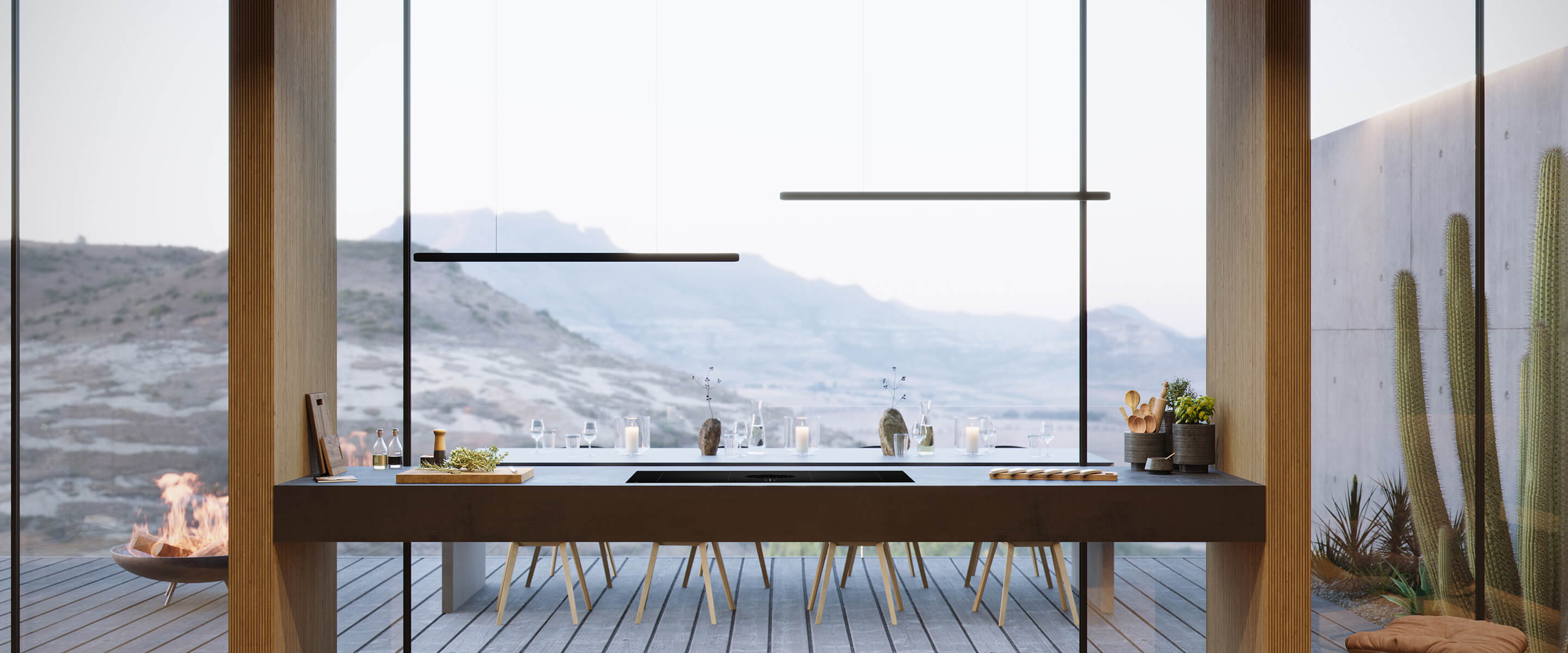 A kitchen island in front of a large floor to ceiling window.