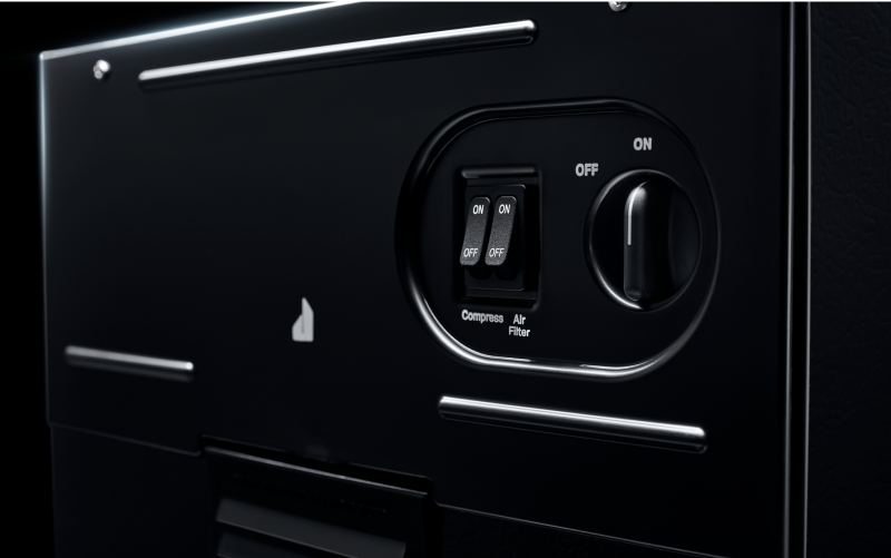 The controls on a JennAir Trash Compactor. 