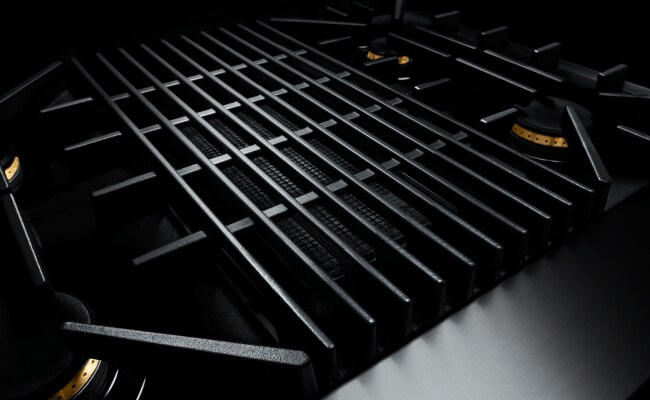 The cast-iron grates on a JennAir Gas Cooktop. 