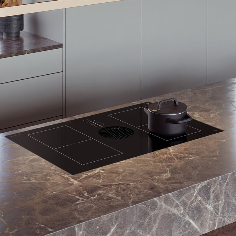 A 36-inch induction cooktop in a modern kitchen.