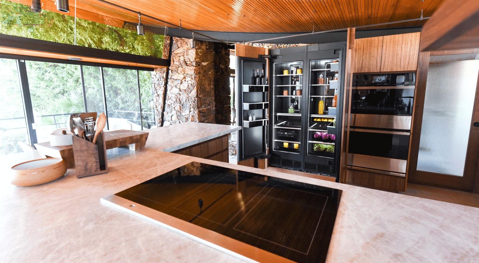 Open refrigerator in a high-end kitchen