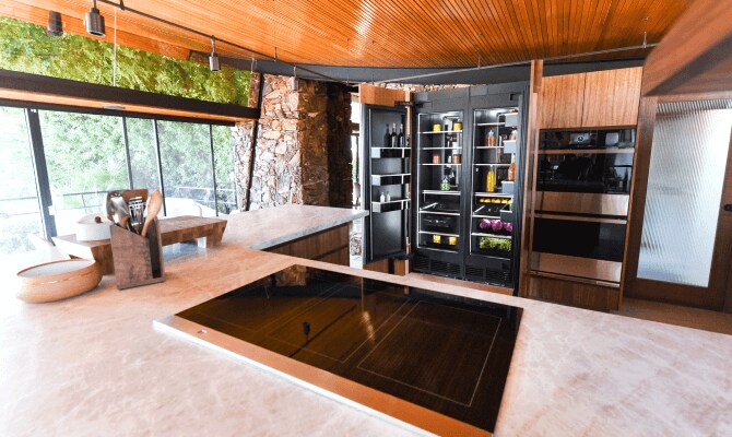 Open refrigerator in a high-end kitchen Open refrigerator in a high-end kitchen