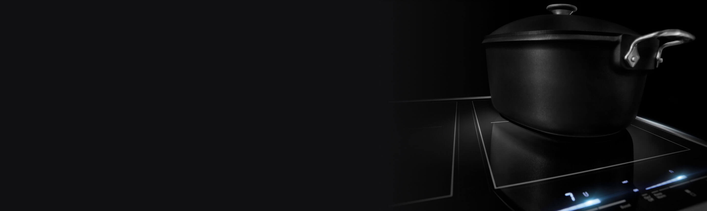 Black pot on an induction cooktop