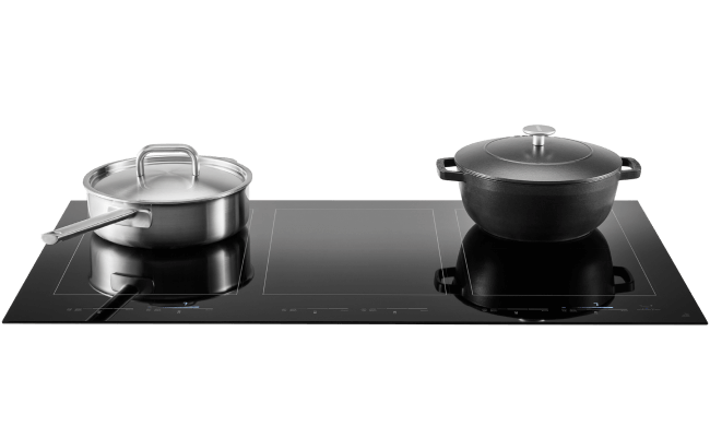 Pots and pans on a JennAir® induction cooking surface Pots and pans on a JennAir® induction cooking surface