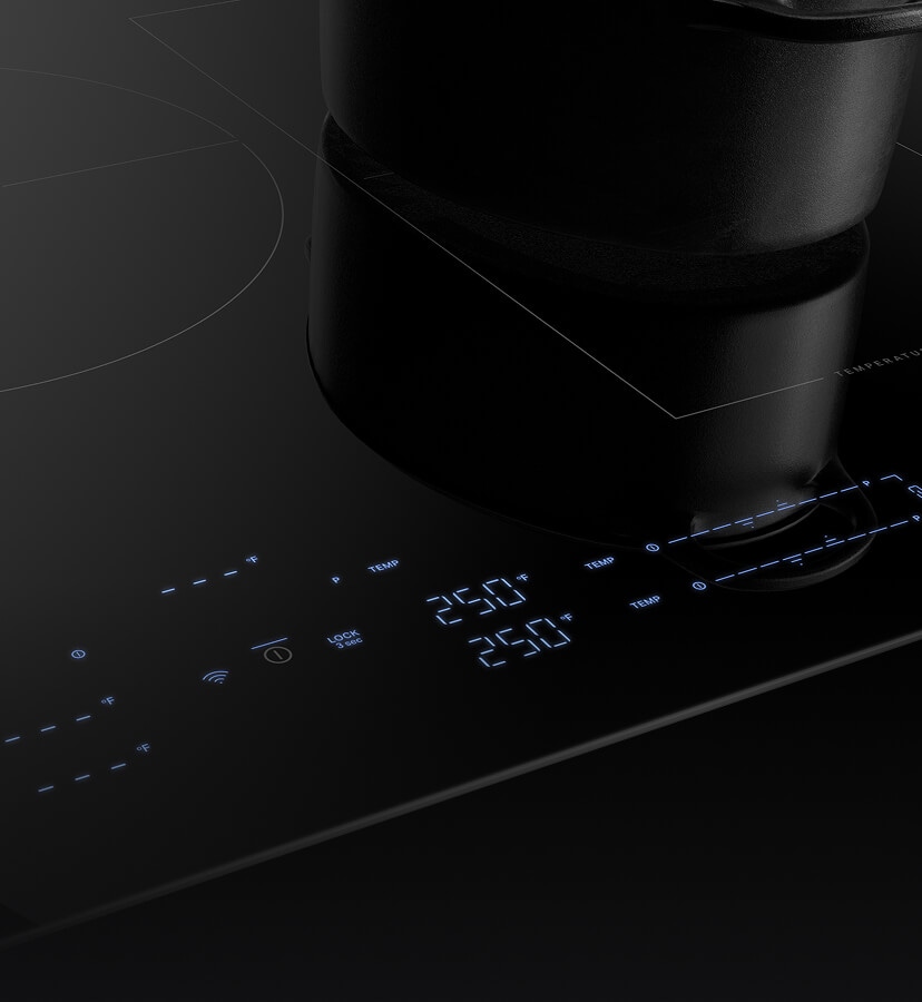 Lit up controls on the new JennAir® Induction Cooktop with Temperature Controlled Cooking.