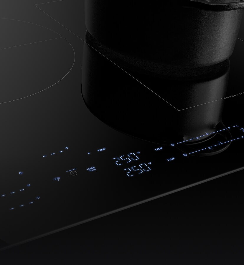 Lit up controls on the new JennAir® Induction Cooktop with Temperature Controlled Cooking. 