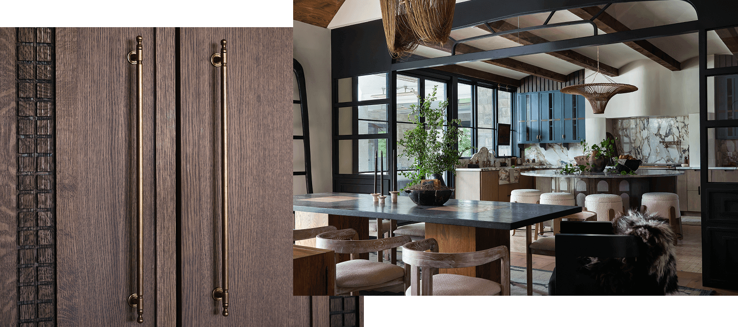 A close up of the handles of the paneled refrigerator. A kitchen and dining room with blue accents and multiple seating areas.