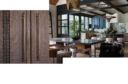 A close up of the handles of the paneled refrigerator. A kitchen and dining room with blue accents and multiple seating areas. A close up of the handles of the paneled refrigerator. A kitchen and dining room with blue accents and multiple seating areas.
