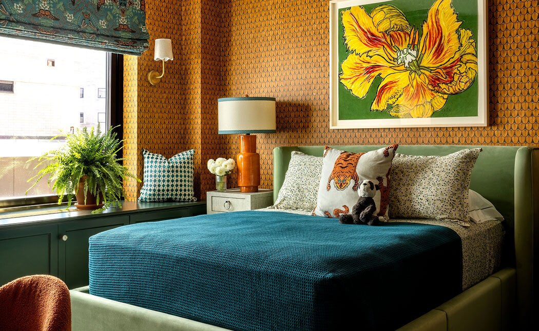 An orange and blue bedroom designed by Corey Damen Jenkins. An orange and blue bedroom designed by Corey Damen Jenkins.