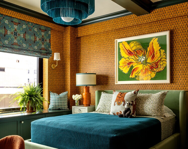 An orange and blue bedroom designed by Corey Damen Jenkins. An orange and blue bedroom designed by Corey Damen Jenkins.
