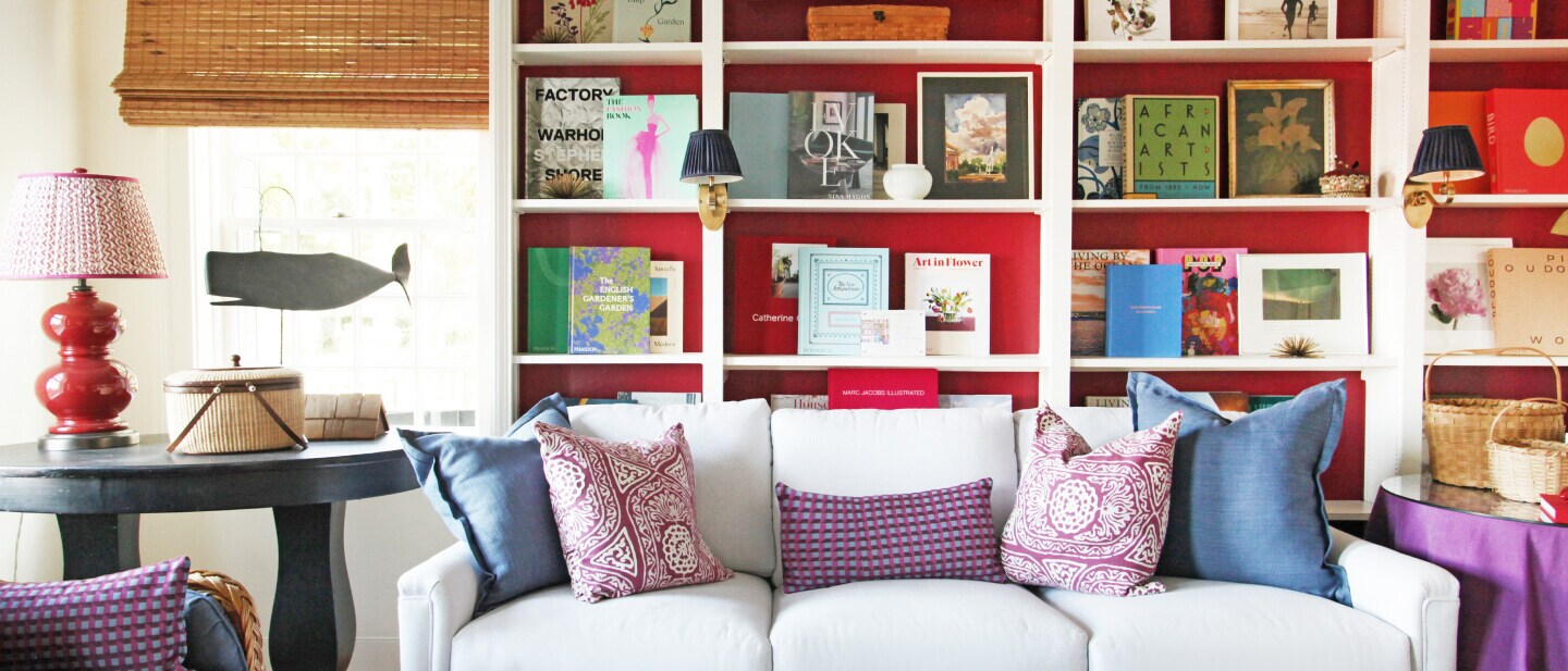 The bookshelves and couches in the reading room. 