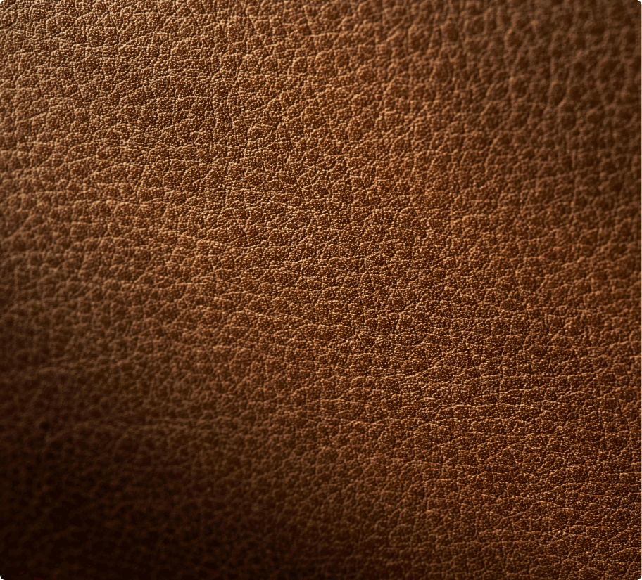 A close-up of the texture of a Cognac Cuts Leather Panel.