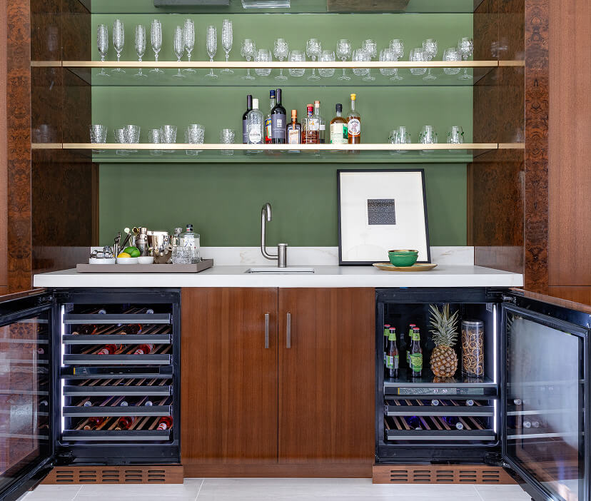 Luxury JennAir® undercounter wine refrigerators in a modern open kitchen
