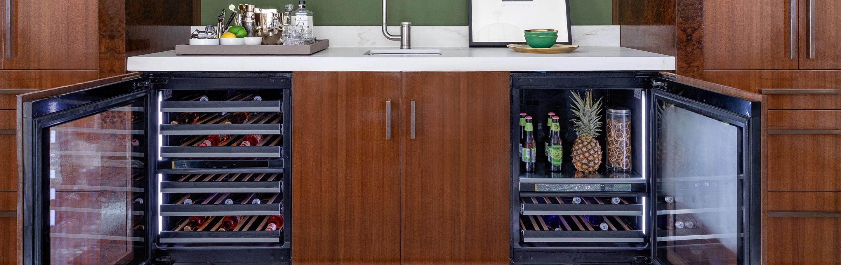 Luxury JennAir® undercounter wine refrigerators in a modern open kitchen