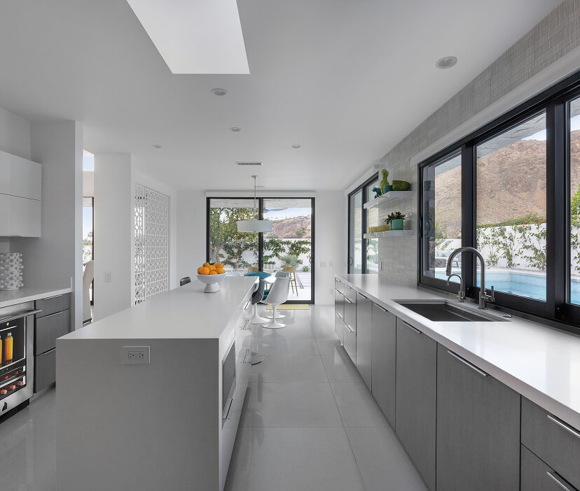 A modern neutral kitchen with open sightlines