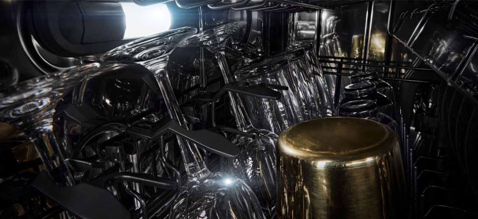 Wine glasses and other glassware in a JennAir Dishwasher.  Wine glasses and other glassware in a JennAir Dishwasher.