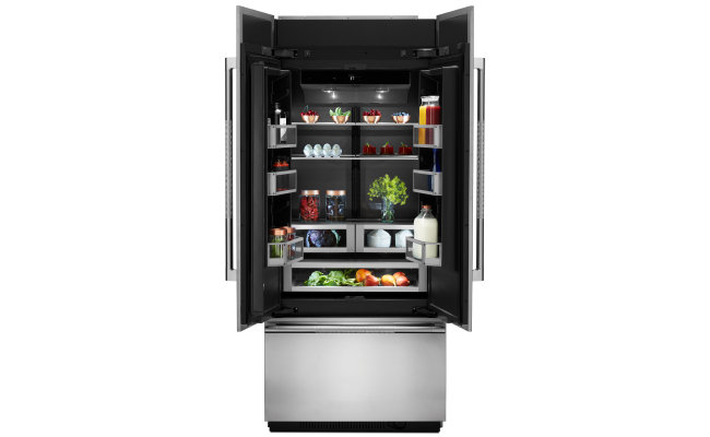 A fully stocked JennAir built-in refrigerator. A fully stocked JennAir built-in refrigerator.