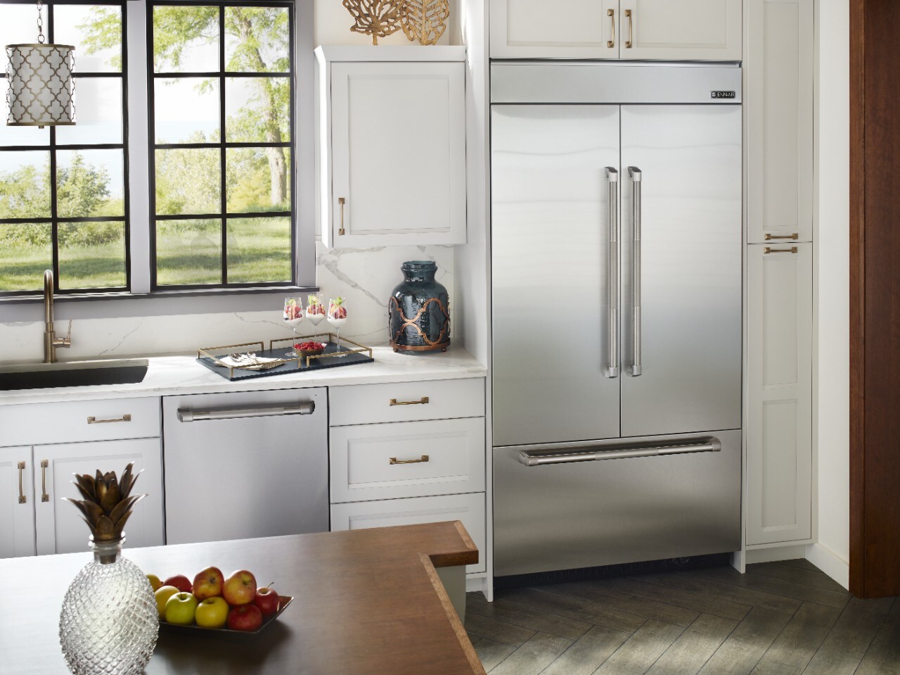 A french door refrigerator in a kitchen.