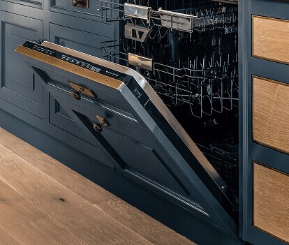 A luxury kitchen with a JennAir® quiet dishwasher integrated into cabinetry.