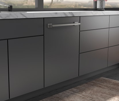 A panel-ready dishwasher blends seamlessly with cabinetry in a luxury kitchen.