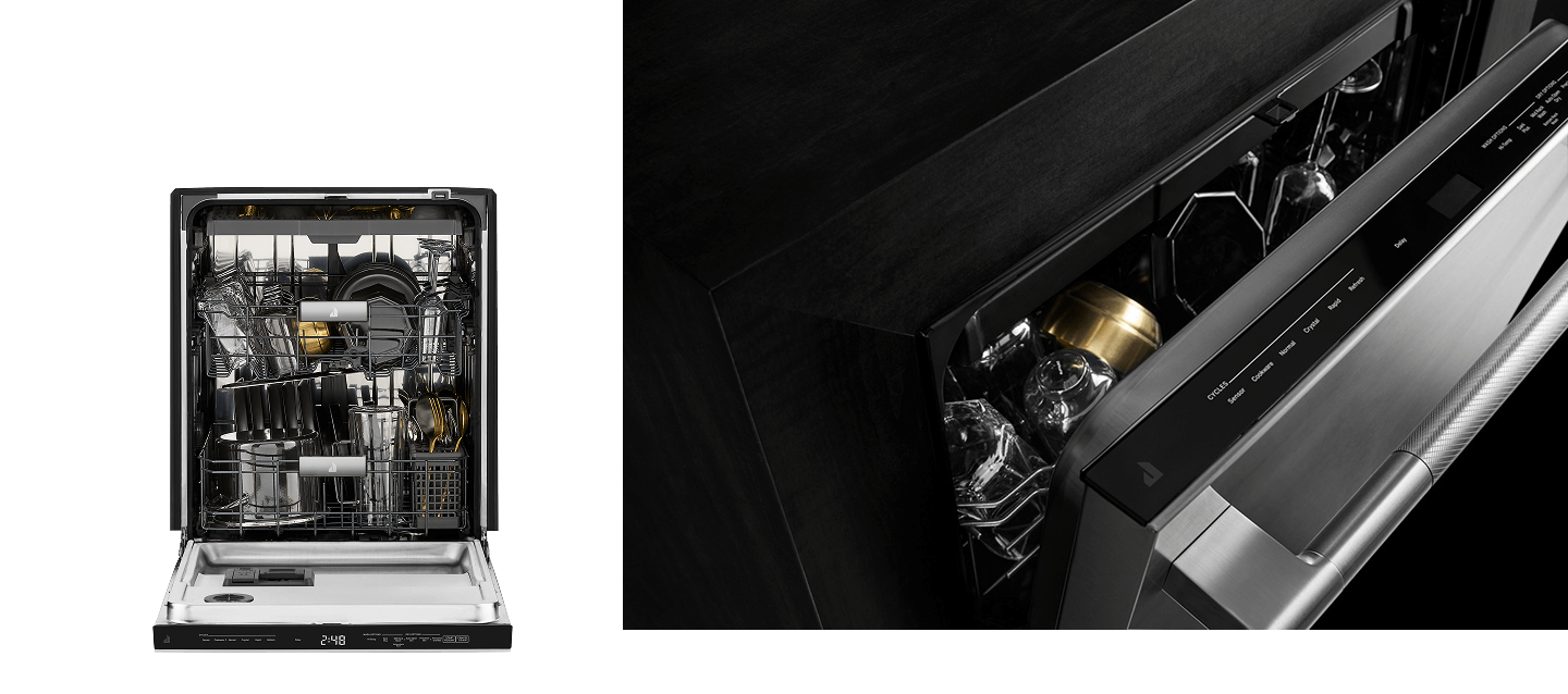 An open dishwasher loaded with dishes. An open dishwasher loaded with dishes.