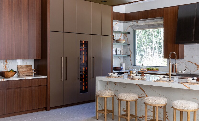 A bright kitchen with hidden appliances and cabinets