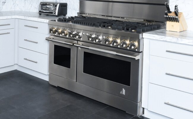 A JennAir Range in a modern white kitchen.