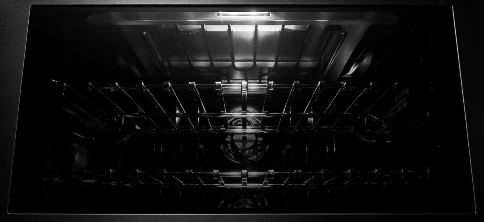 The Daring Obsidian Interior of a JennAir Wall Oven.  The Daring Obsidian Interior of a JennAir Wall Oven.