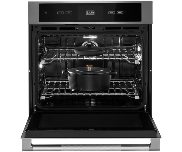  Cookware inside an open JennAir Wall Oven. 