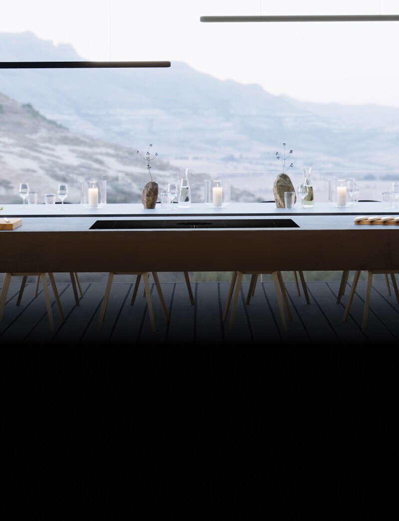 A downdraft cooktop installed overlooking a beautiful vista.