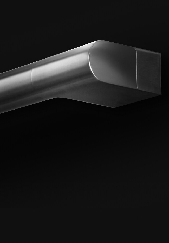 A close-up of the knurling on the handle of a RISE™ Refrigerator.