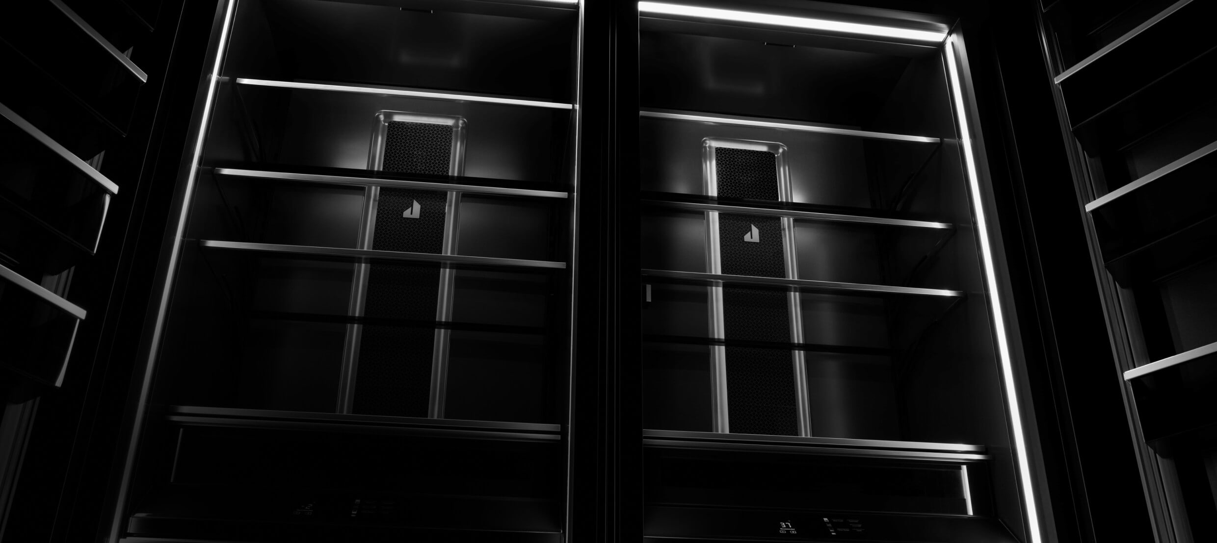 The striking Daring Obsidian interior of a JennAir® Columns pair. 