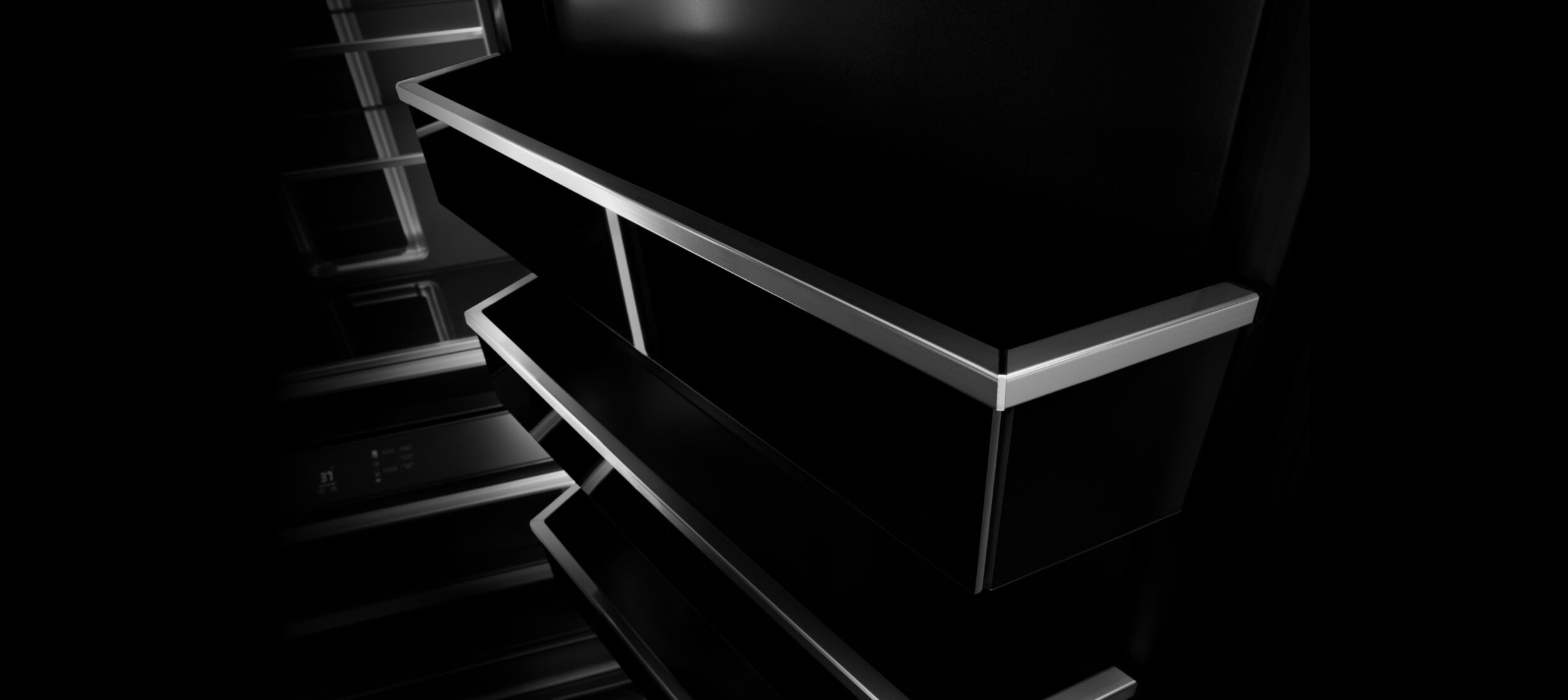  The dark-veiled door bins trimmed with metal inside a JennAir® Column. 