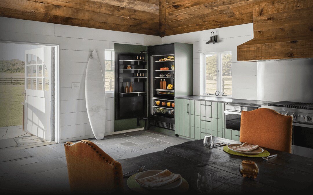  A NOIR™ Professional-Style Range in a blue kitchen.