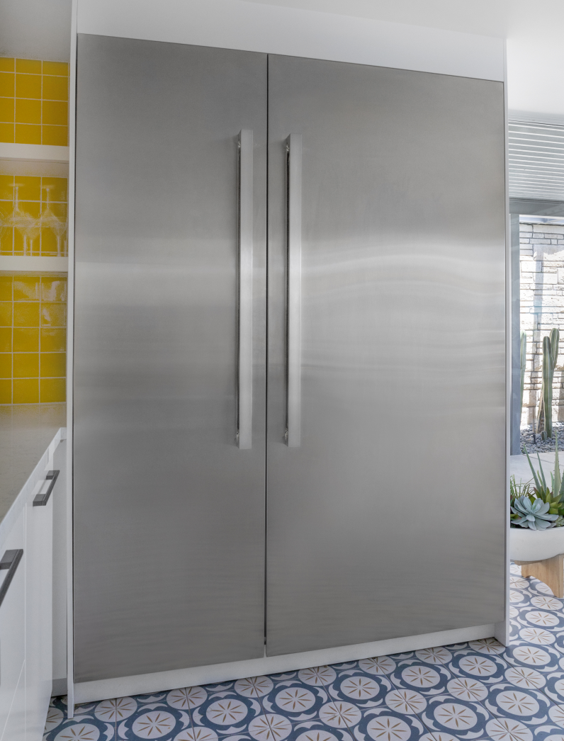A pair of JennAir® NOIR™ Columns in a kitchen.
