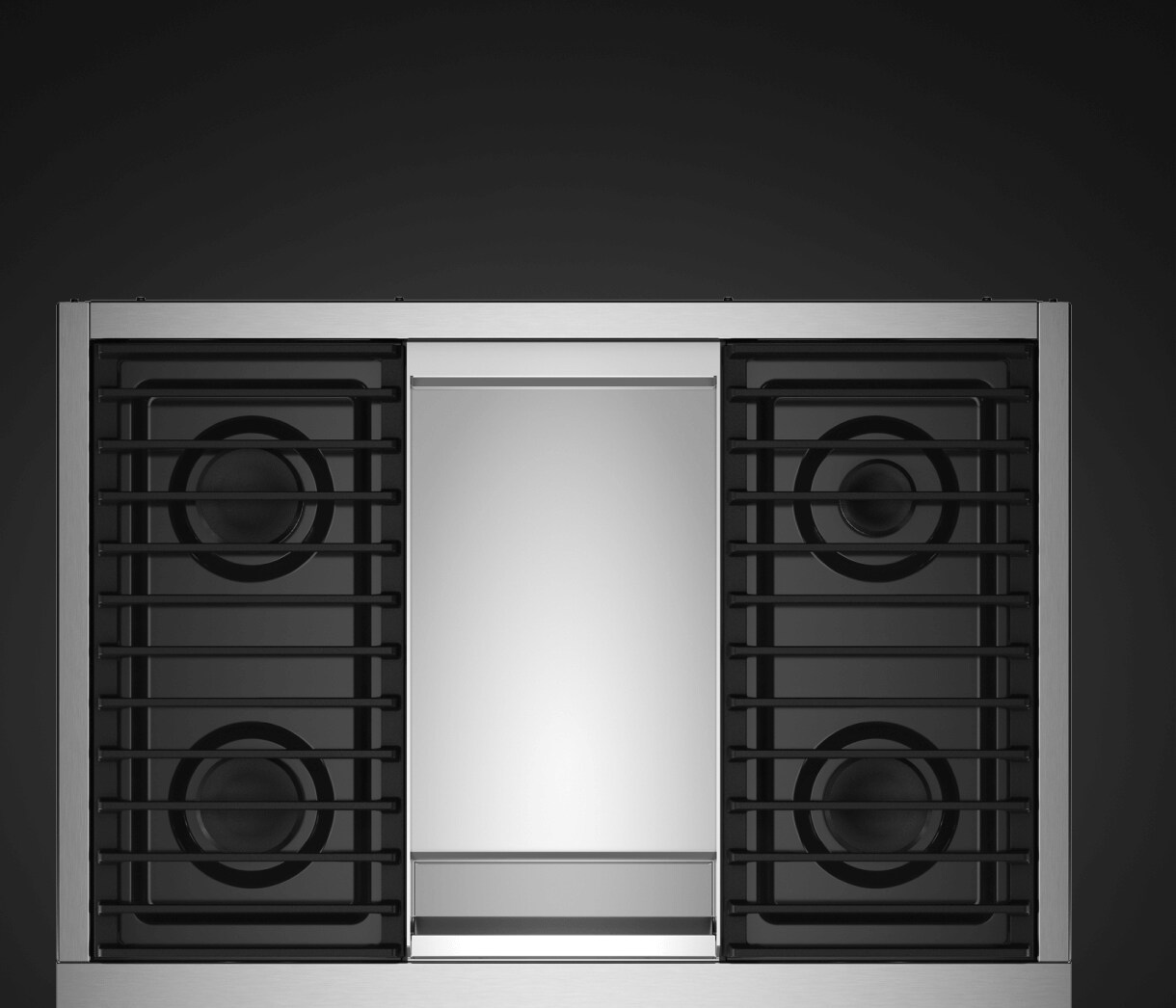 A top-down view of a range with a Chrome-Infused Griddle.