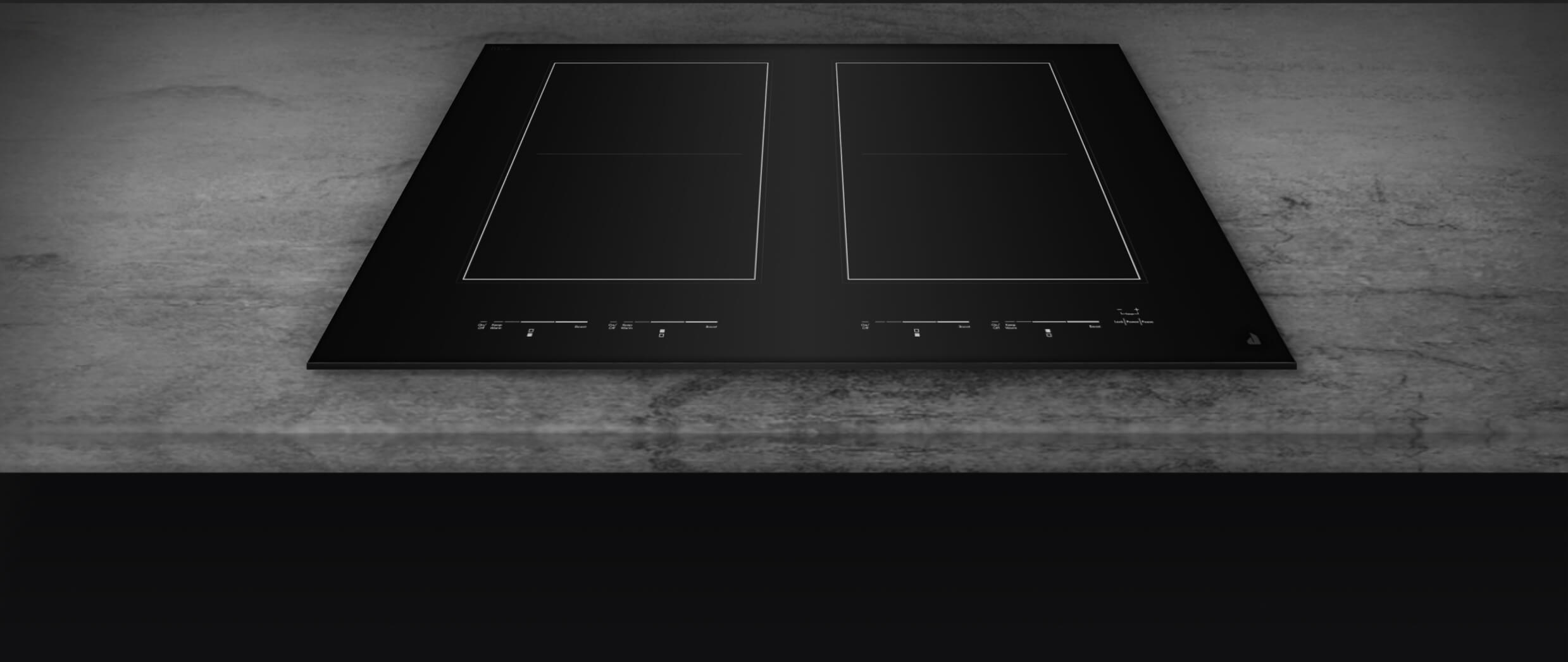 A closeup of the black glass surface of a cooktop.