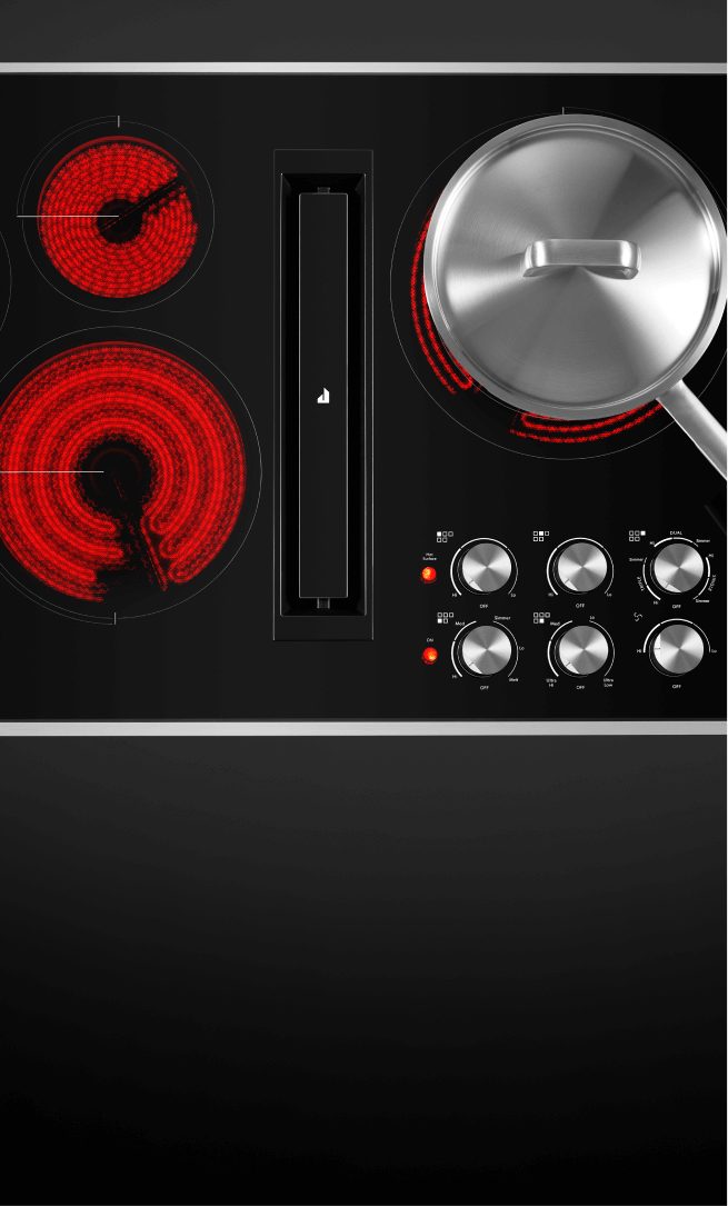 Top-down view of an electric radiant cooktop with the elements glowing red. Top-down view of an electric radiant cooktop with the elements glowing red.