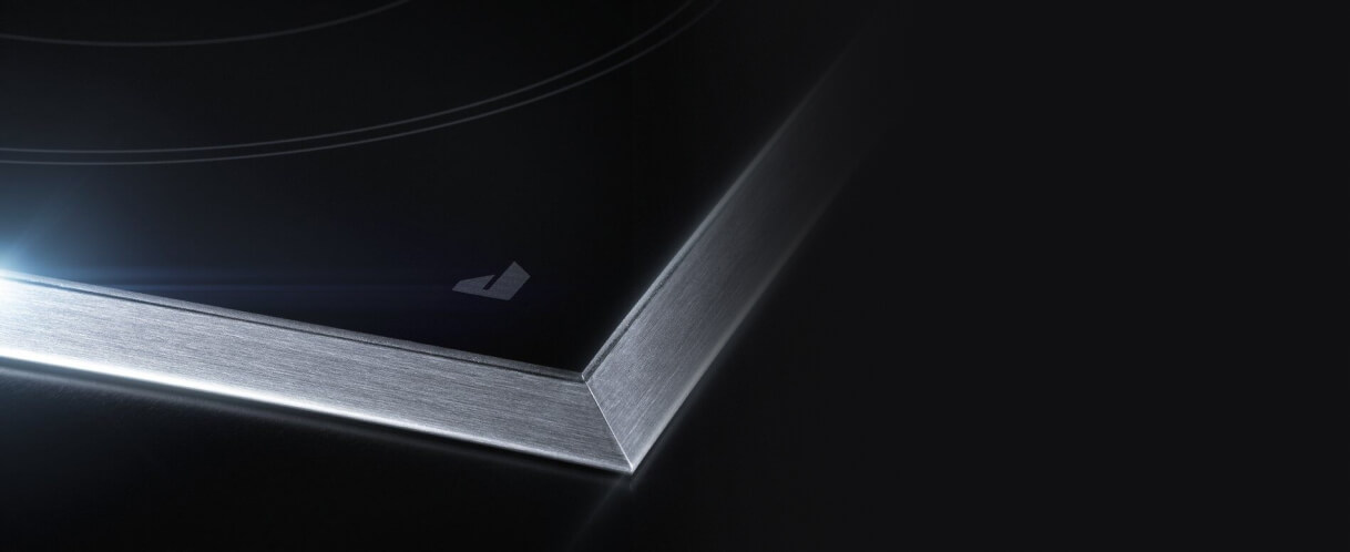 Closeup of the shining cooktop surface.