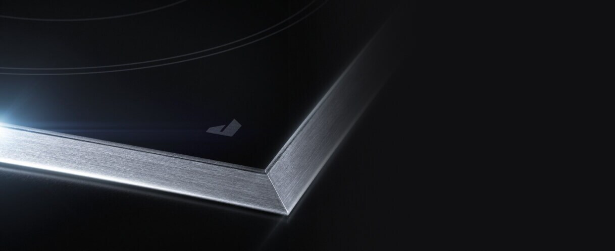 Closeup of the shining cooktop surface.