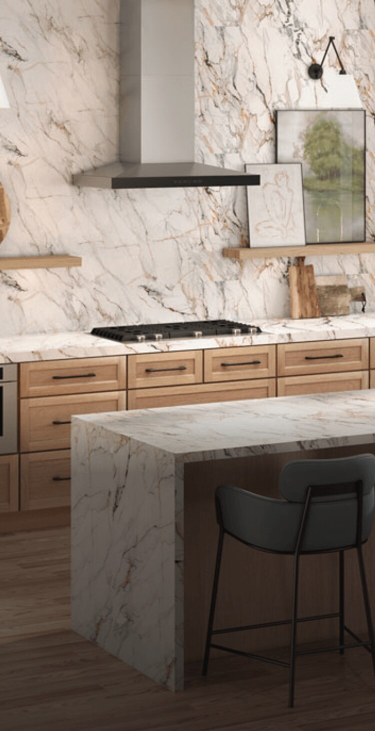 A JennAir® Gas Cooktop in a contemporary kitchen. A JennAir® Gas Cooktop in a contemporary kitchen.