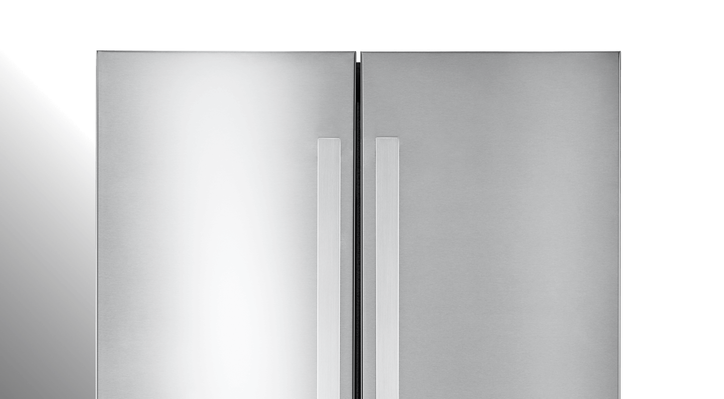 A close up of the NOIR™ Design Expression Handle on stainless steel panels.