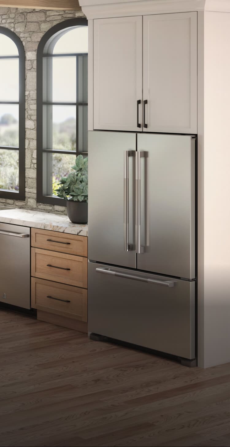A kitchen featuring JennAir® appliances and a French Door Freestanding Refrigerator.