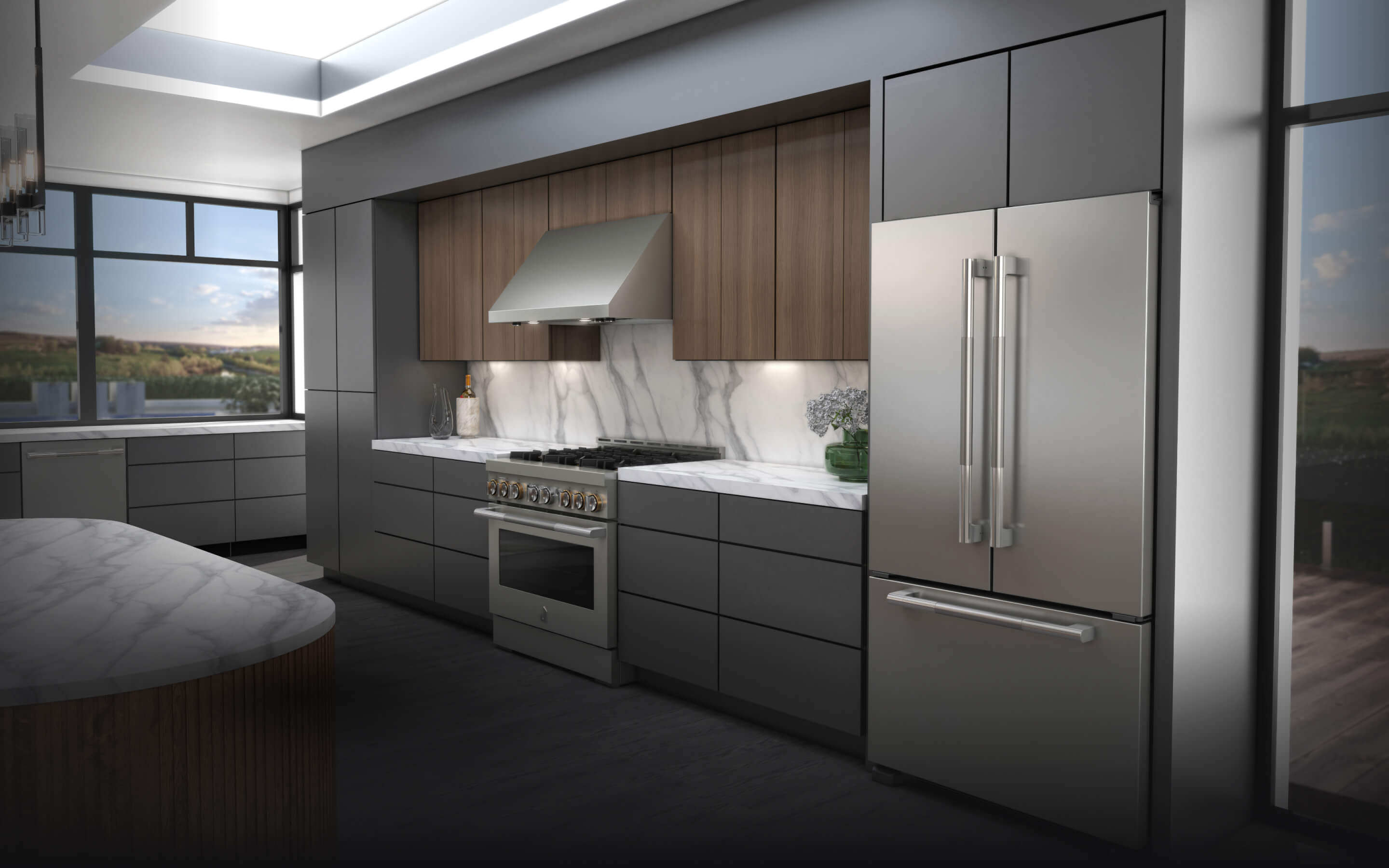 A kitchen featuring JennAir® appliances and a French Door Freestanding Refrigerator.
