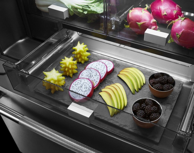 A close up on the shelves and door bins of an Obsidian interior refrigerator.
