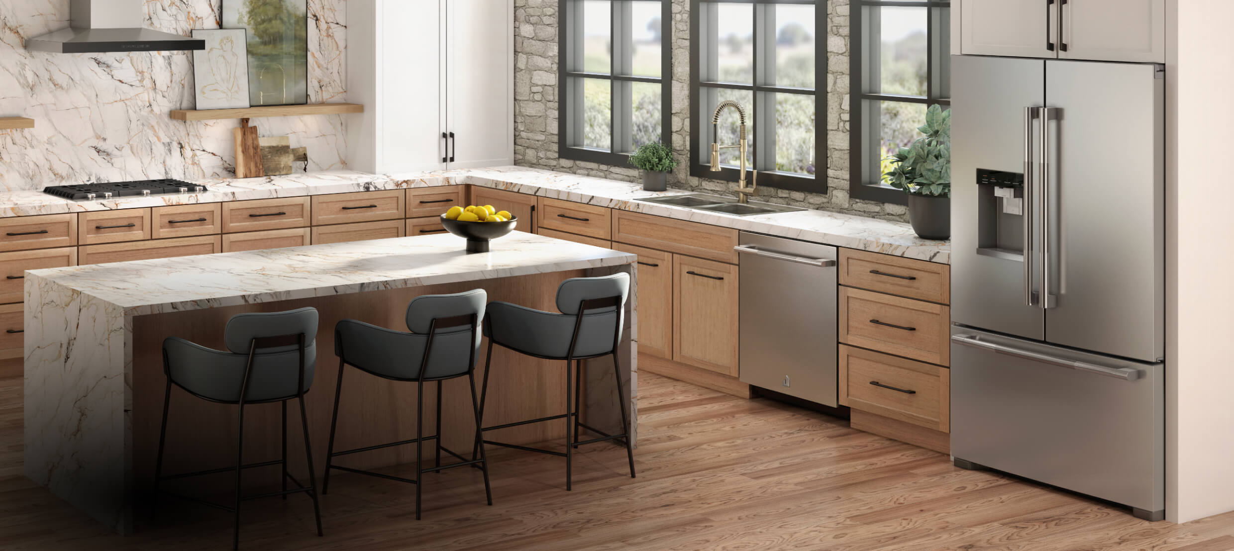 A beautiful, bright kitchen featuring a suite of JennAir® appliances and a RISE™ french door freestanding refrigerator. 
