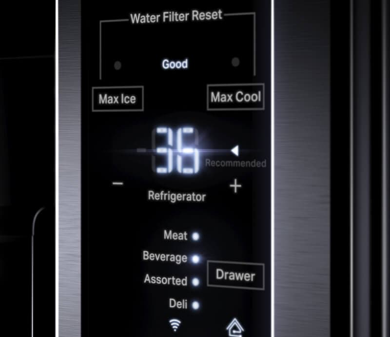 The touch controls on the exterior of a freestanding refrigerator.